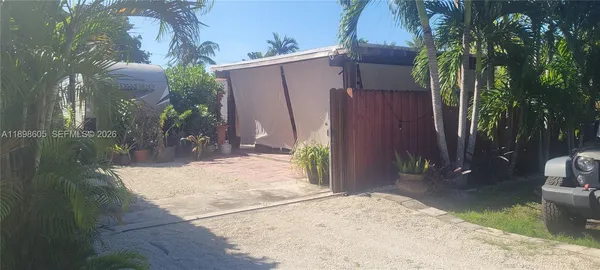 a view of backyard of house