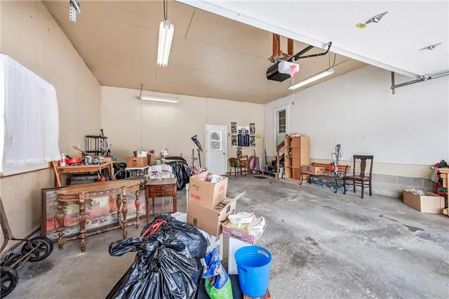 a front view of a house with a garage