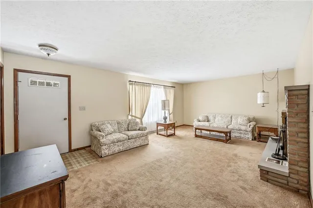 a living room with furniture and a couch