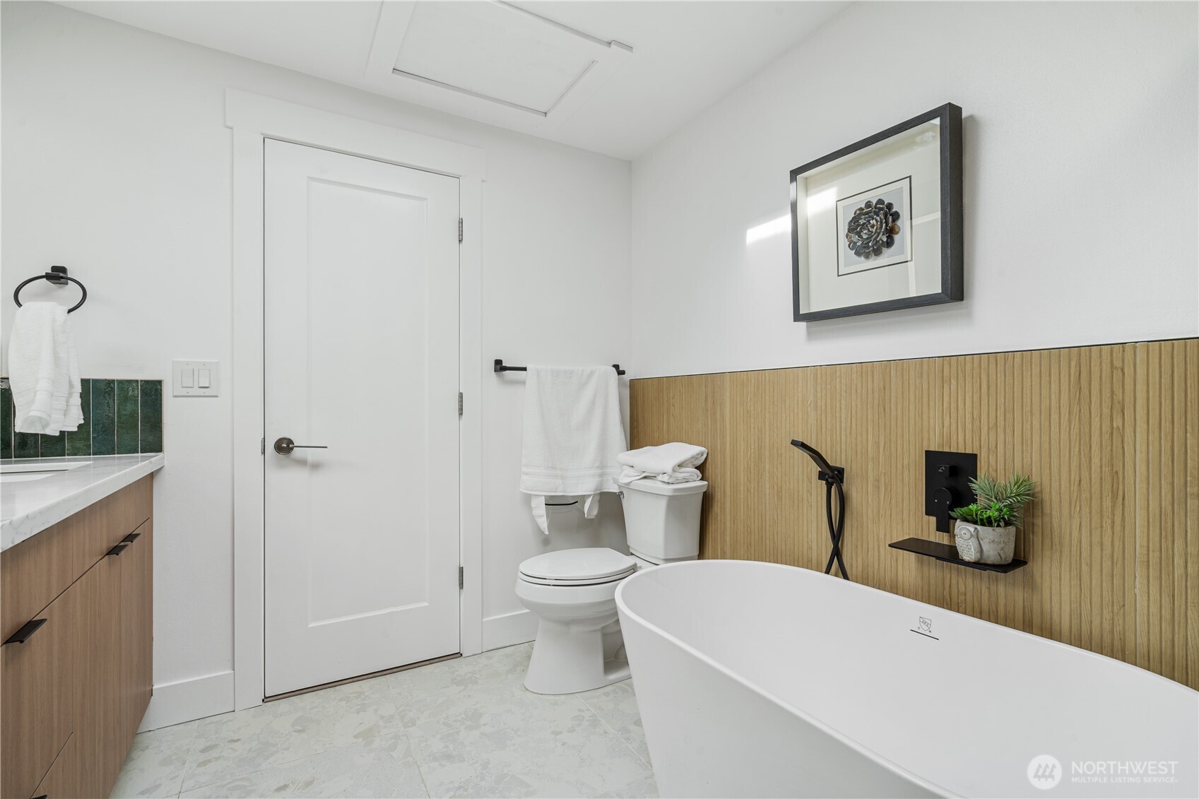 2539 128th Avenue Southeast Bellevue, WA 98005 - Photo 16 of 39 a bathroom with a toilet and a shower