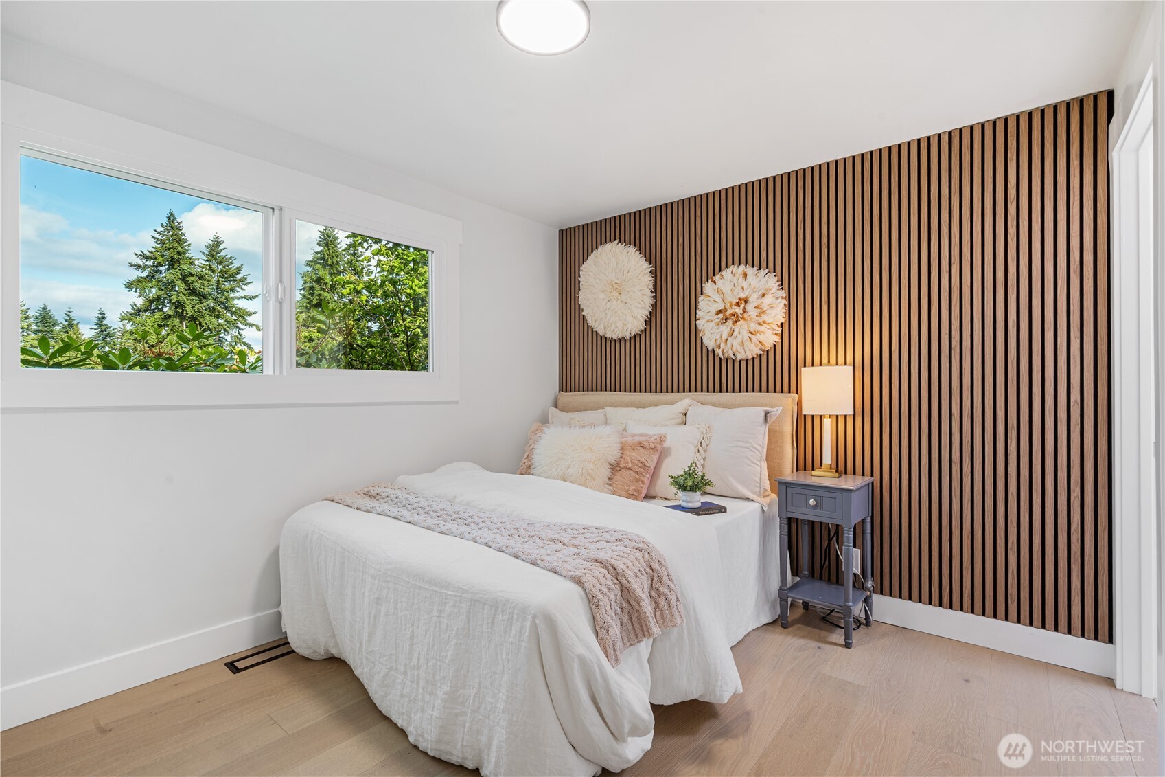 2539 128th Avenue Southeast Bellevue, WA 98005 - Photo 17 of 39 a bedroom with a bed and a window