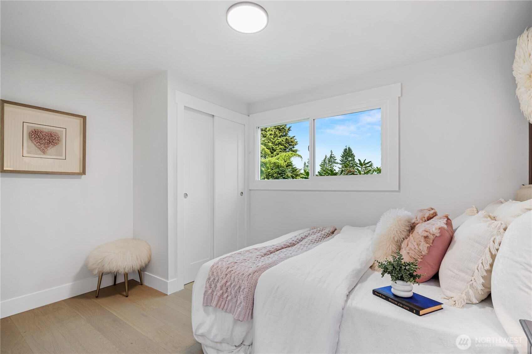 2539 128th Avenue Southeast Bellevue, WA 98005 - Photo 18 of 39 a bedroom with a bed and a window