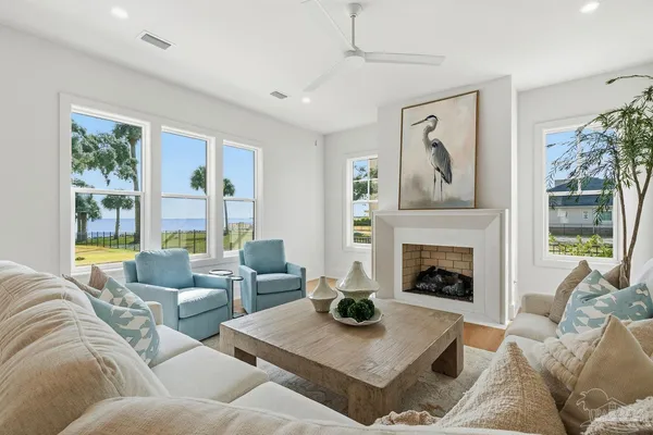 a living room with furniture and a table