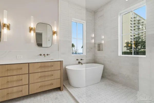 a view of bathroom and bathroom with a bathtub