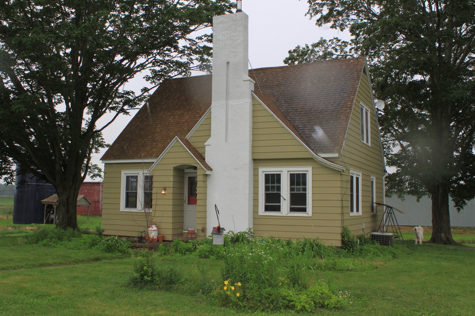 26585 Clark Road Sterling, IL 61081 - Photo 1 of 14 a view of a house with a yard