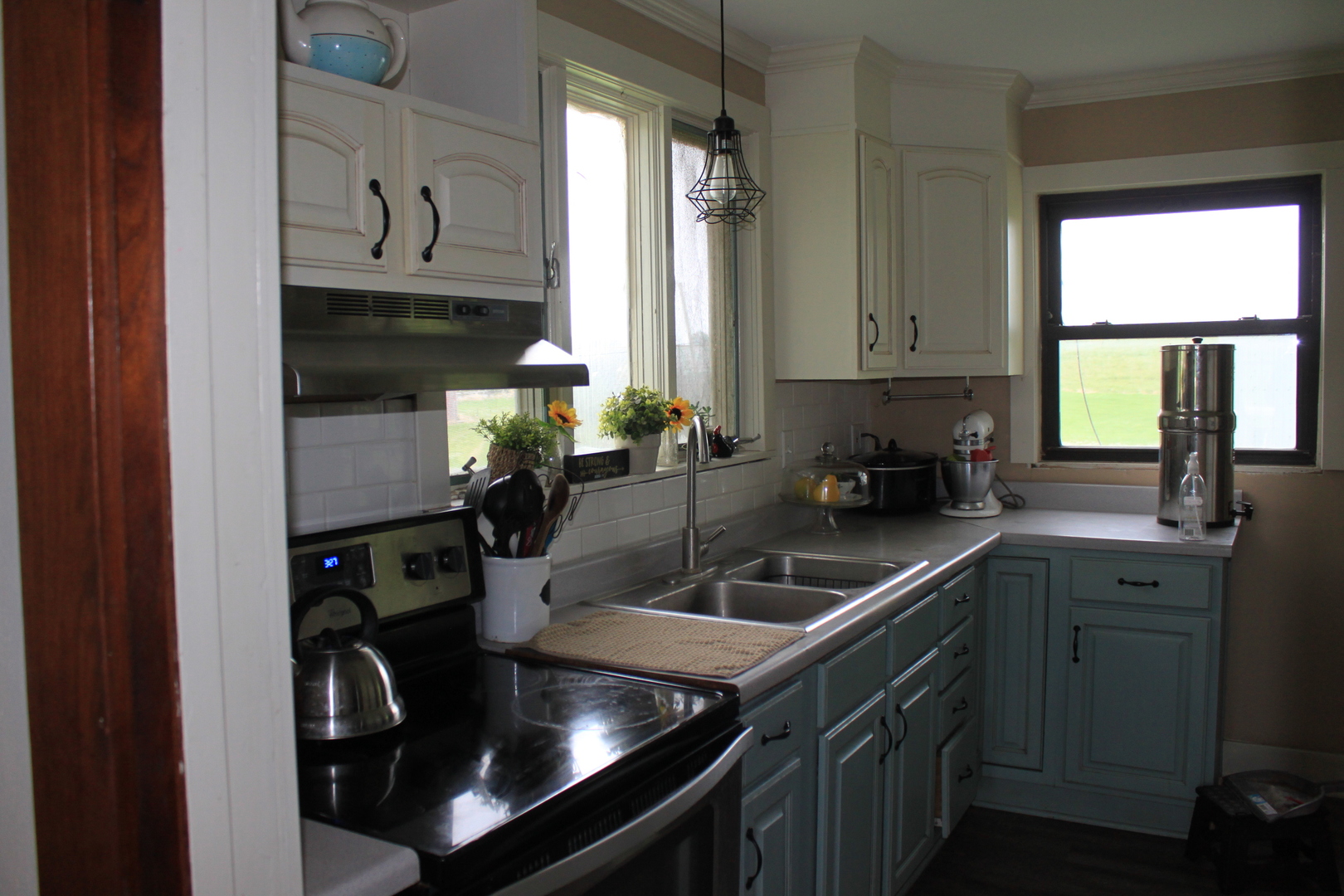 26585 Clark Road Sterling, IL 61081 - Photo 4 of 14 a kitchen with a sink appliances and cabinets