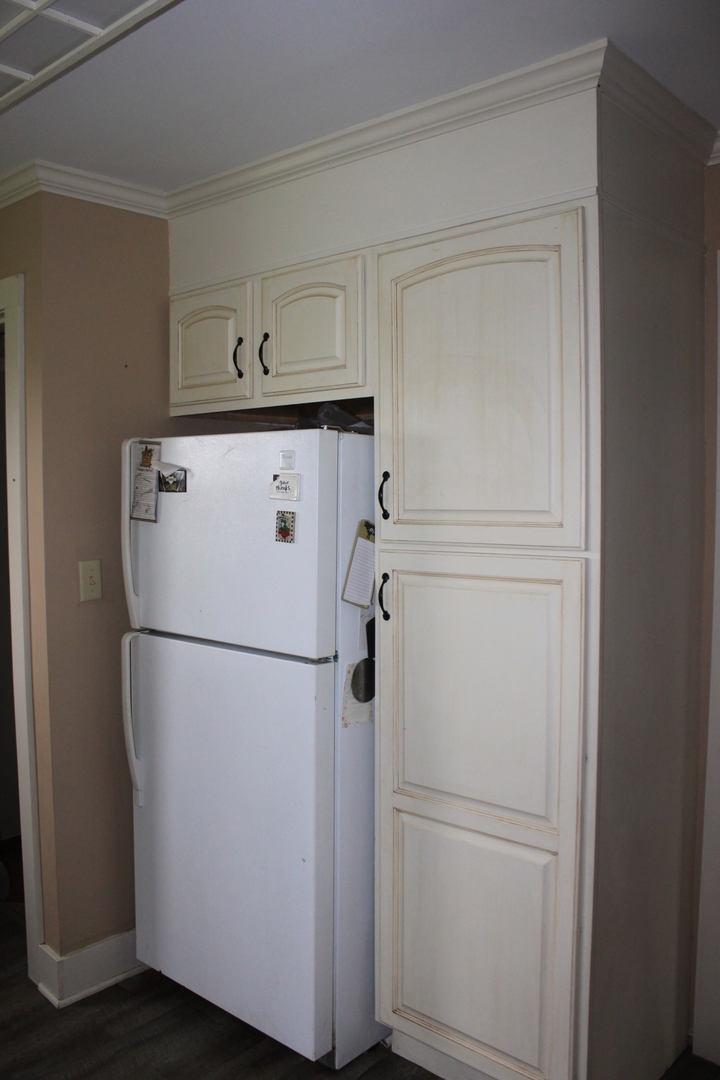 26585 Clark Road Sterling, IL 61081 - Photo 6 of 14 a white refrigerator freezer and a stove sitting inside of a kitchen