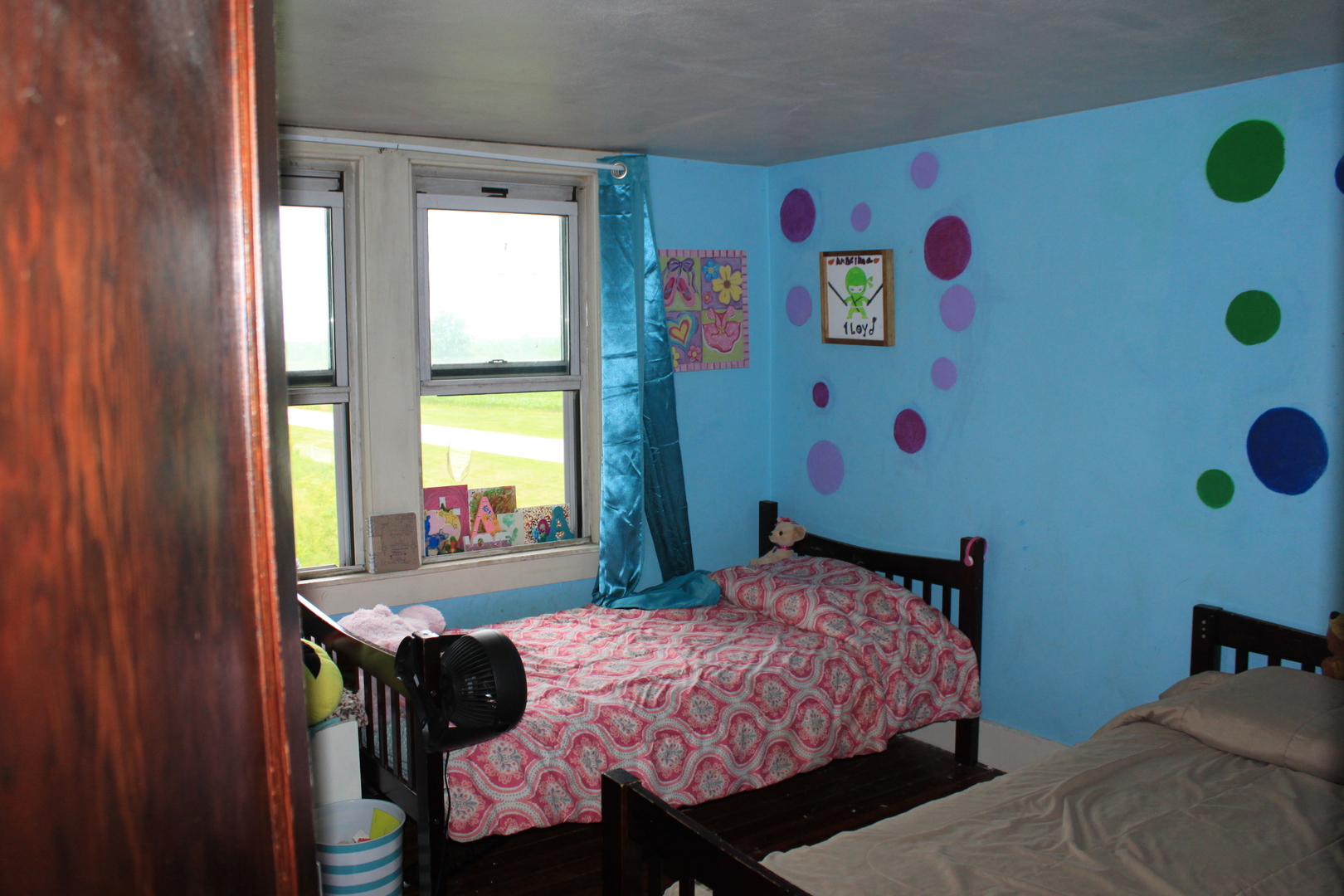 26585 Clark Road Sterling, IL 61081 - Photo 9 of 14 a bedroom with a bed and a table in it