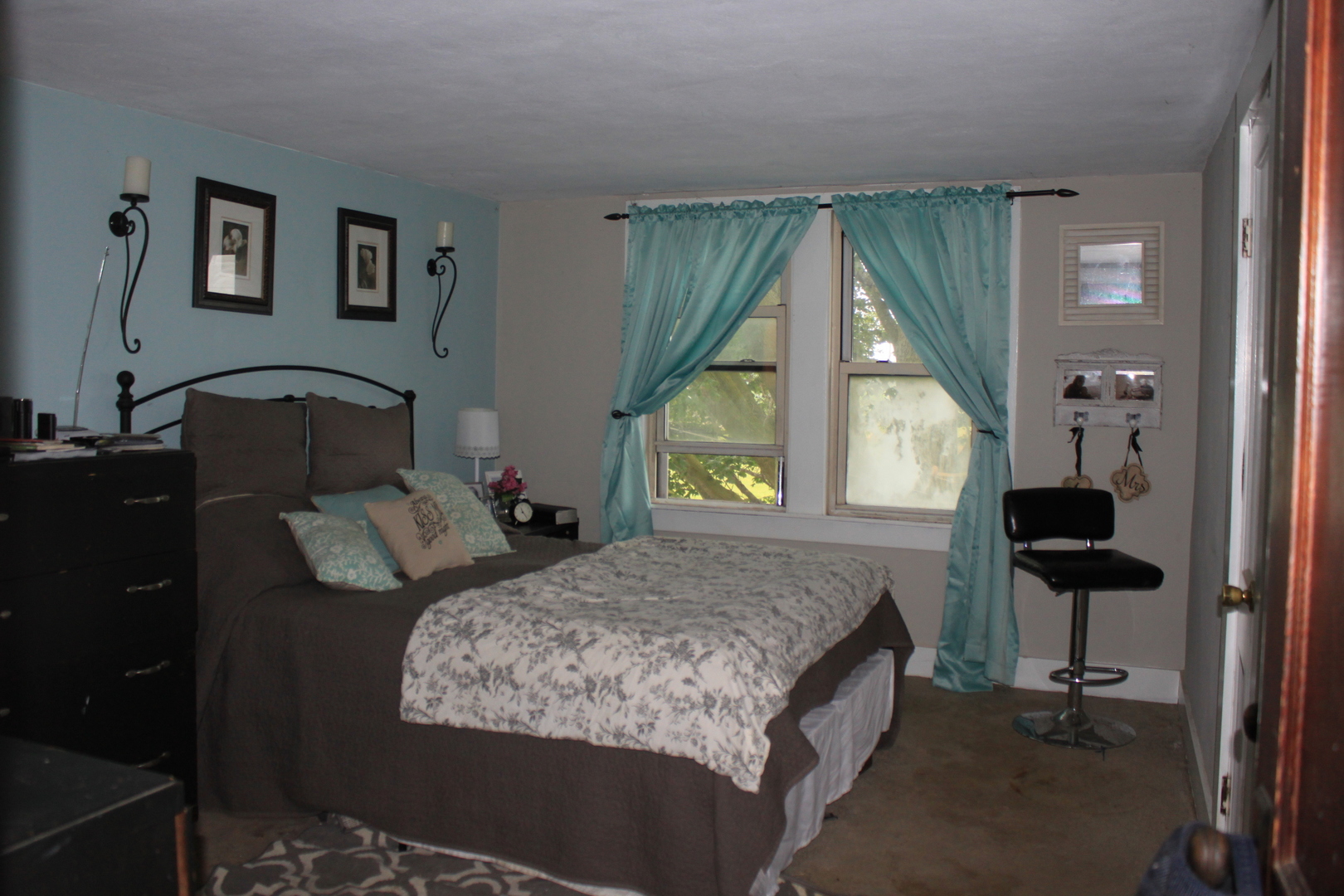 26585 Clark Road Sterling, IL 61081 - Photo 10 of 14 a bedroom with a bed and two windows