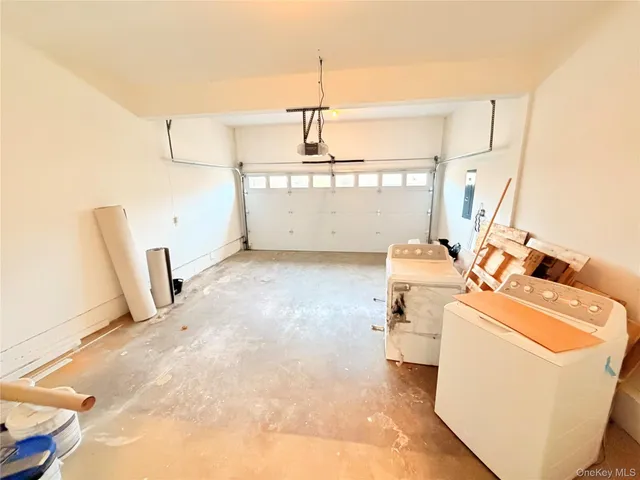 a view of a storage & utility room with washer and dryer
