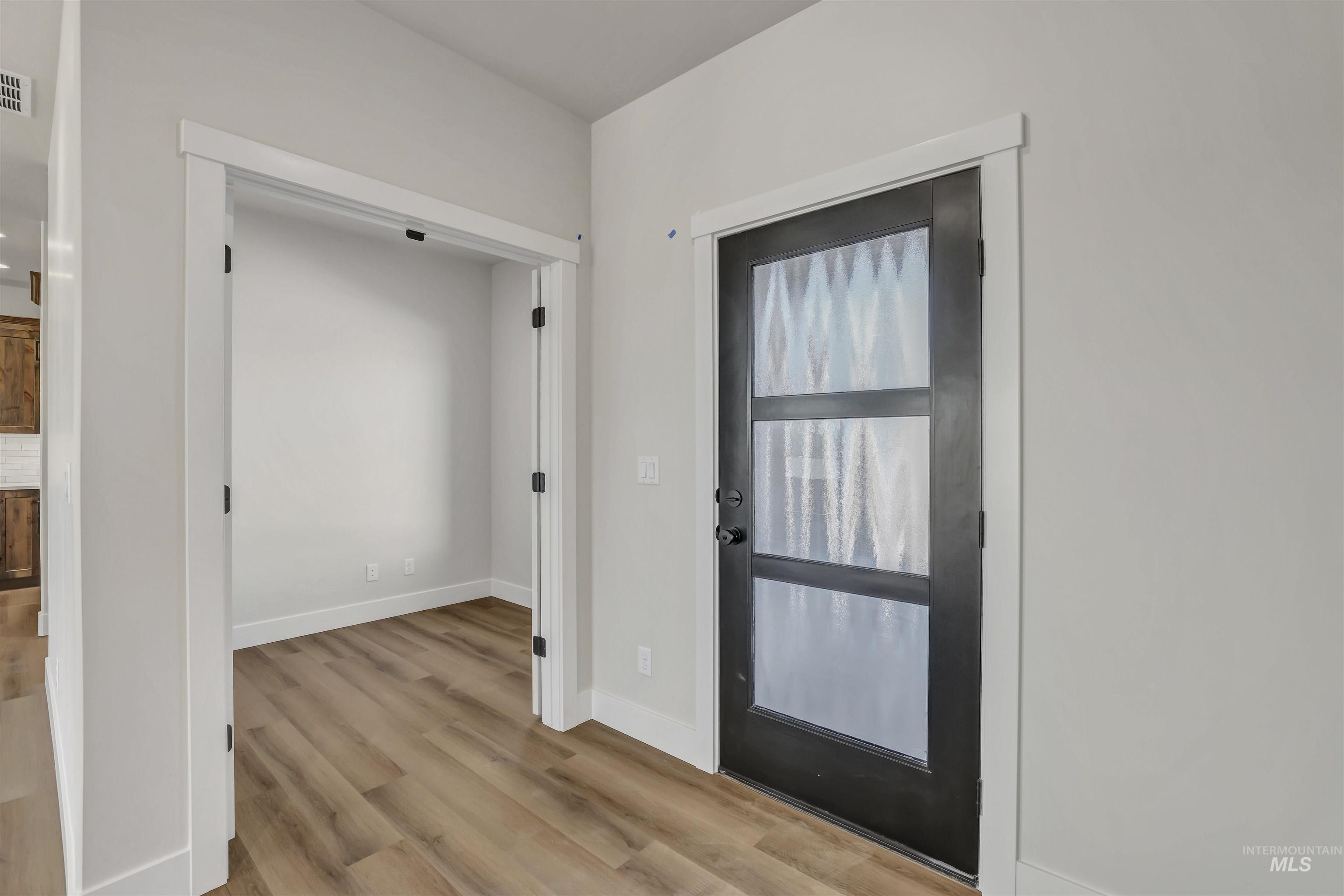 941 Gregory Way Twin Falls, ID 83301 - Photo 23 of 40 Foyer featuring wood finished floors and baseboards