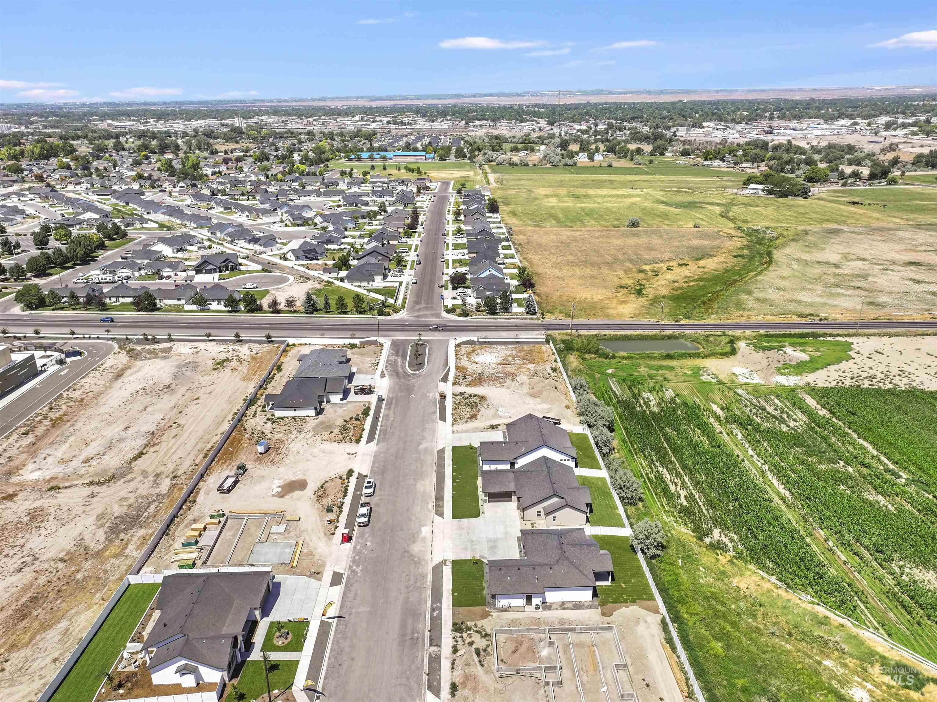 941 Gregory Way Twin Falls, ID 83301 - Photo 39 of 40 Aerial view of property and surrounding area with nearby suburban area