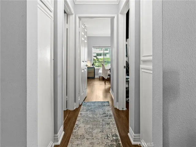 a view of a hallway with white walls
