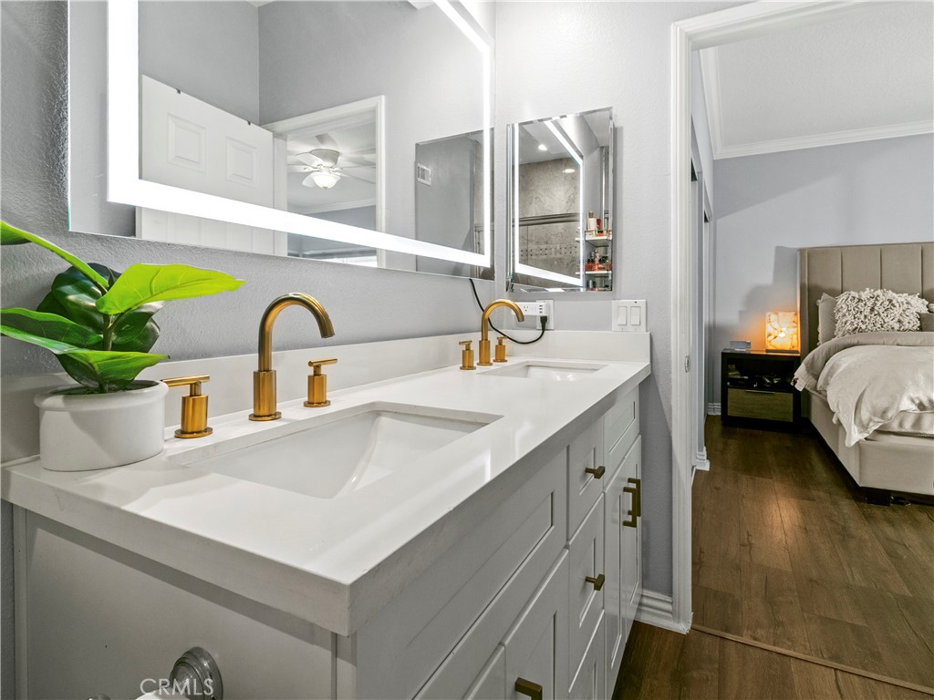 210 Lille Lane, Unit 218 Newport Beach, CA 92663 - Photo 21 of 45 a bathroom with a sink and a mirror