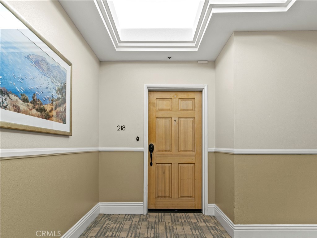 210 Lille Lane, Unit 218 Newport Beach, CA 92663 - Photo 28 of 45 a view of front door