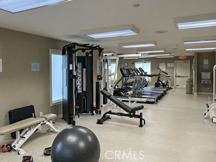 210 Lille Lane, Unit 218 Newport Beach, CA 92663 - Photo 33 of 45 a view of a room with gym equipment