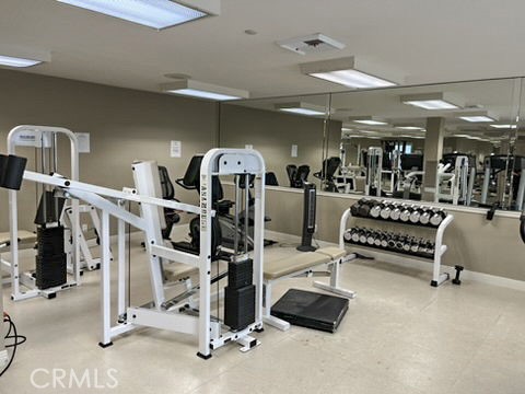 210 Lille Lane, Unit 218 Newport Beach, CA 92663 - Photo 34 of 45 a view of a room with gym equipment
