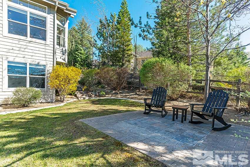 3355 Sierra Crest Way Reno, NV 89519 - Photo 22 of 25 a view of a swimming pool with lawn chairs and plants