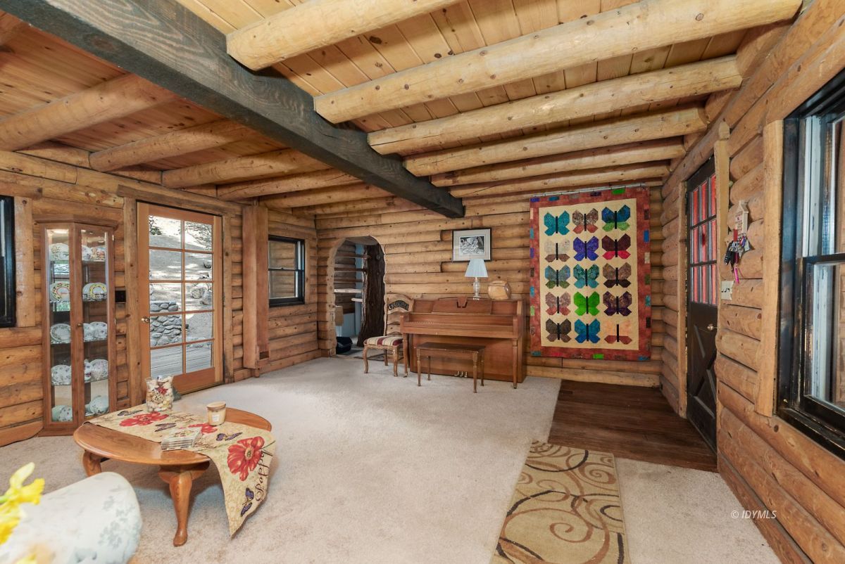 25264 Cougar Road Idyllwild, CA 92549 - Photo 11 of 40 a room with furniture and a window