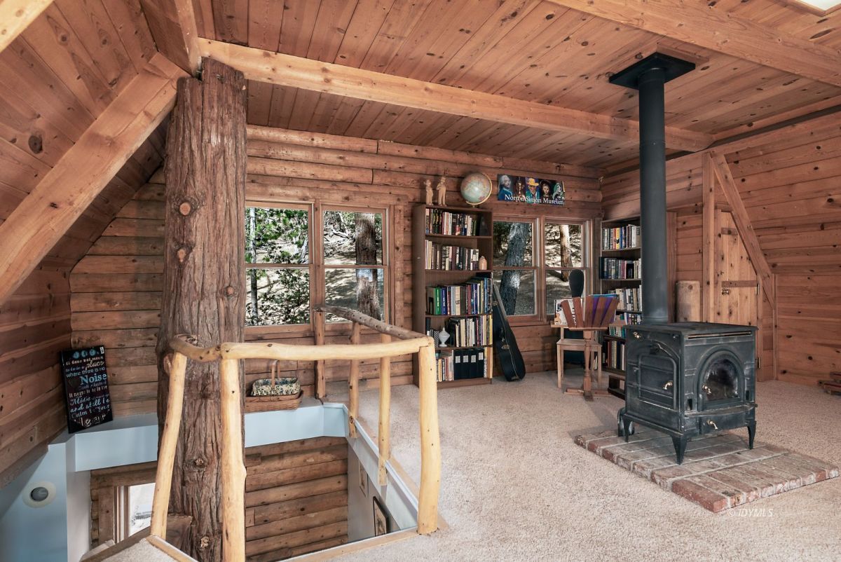 25264 Cougar Road Idyllwild, CA 92549 - Photo 31 of 40 a view of a chairs and table in a patio