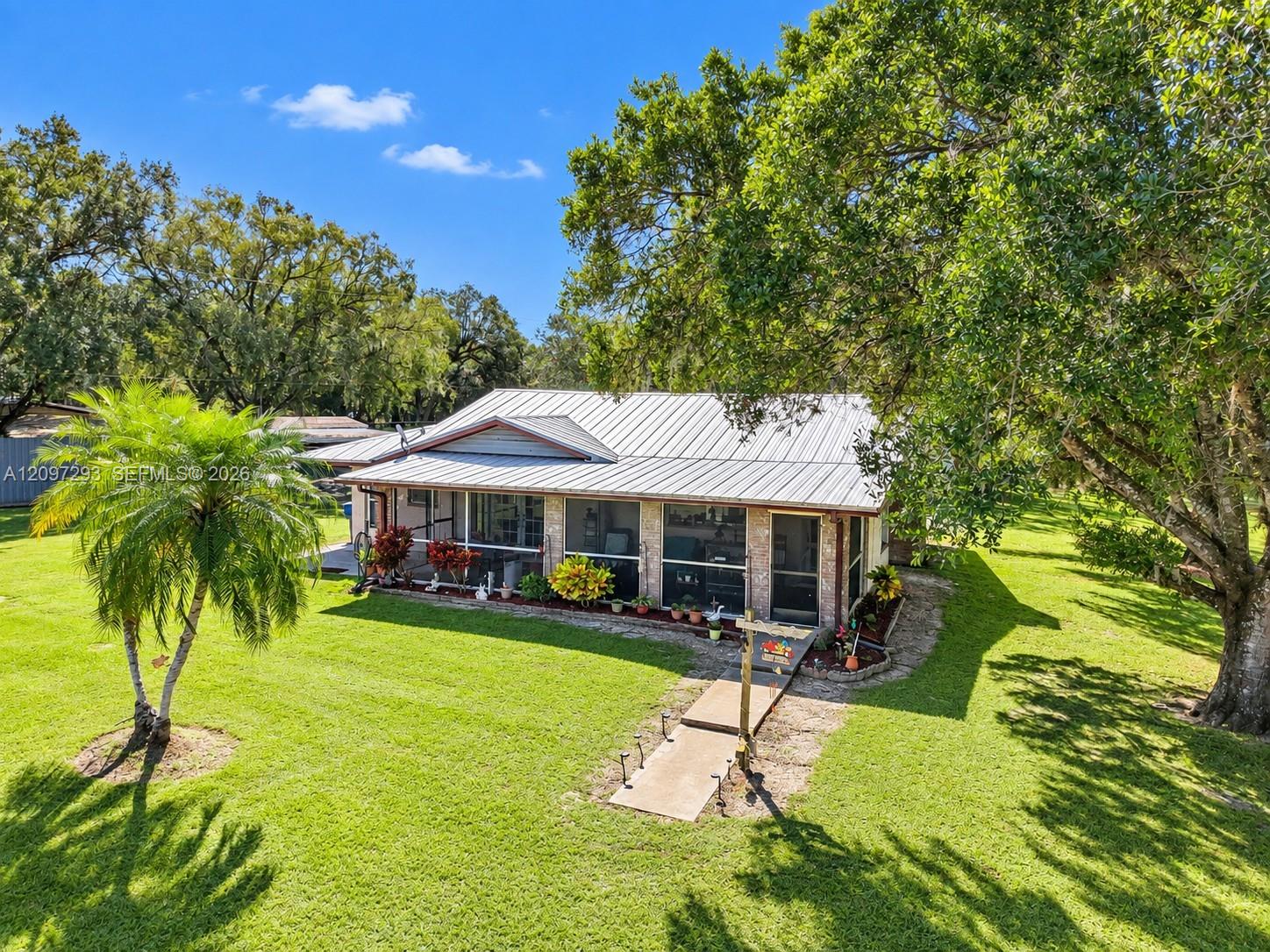 4419 Loblolly Bay Road Southwest LaBelle, FL 33935 - Photo 1 of 46 4419 Loblolly Bay Rd. LaBelle, FL 33935