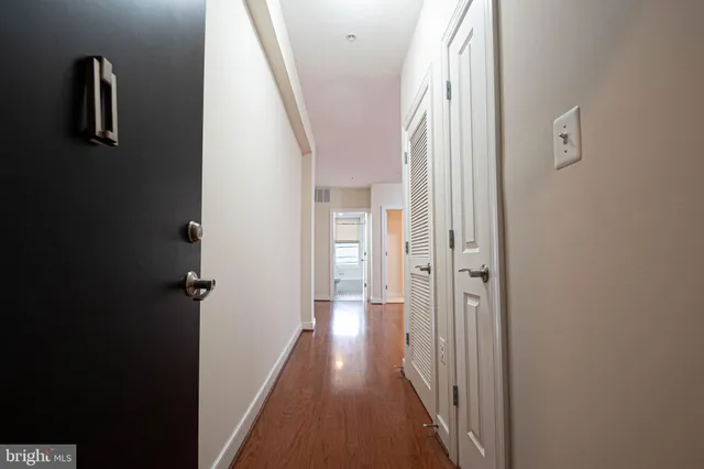 a view of a livingroom with wooden floor