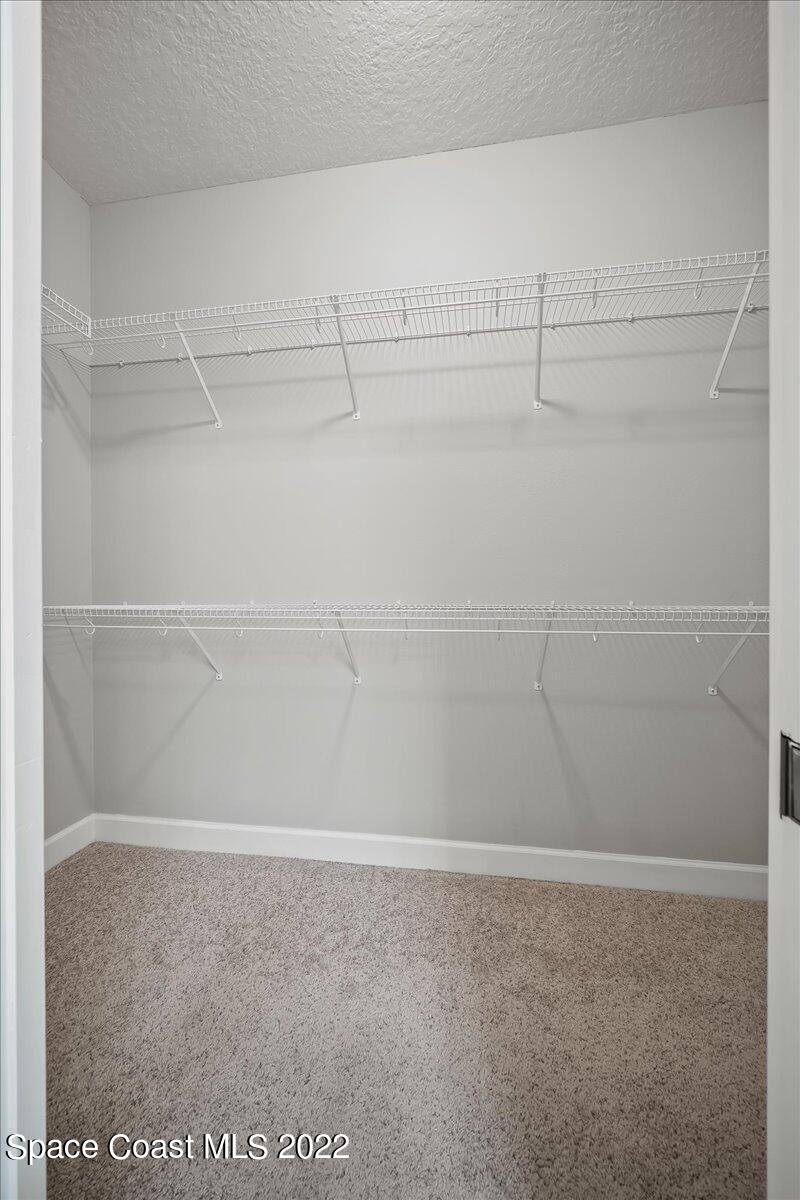 3126 Arden Circle Melbourne, FL 32934 - Photo 18 of 31 Master Walk In Closet