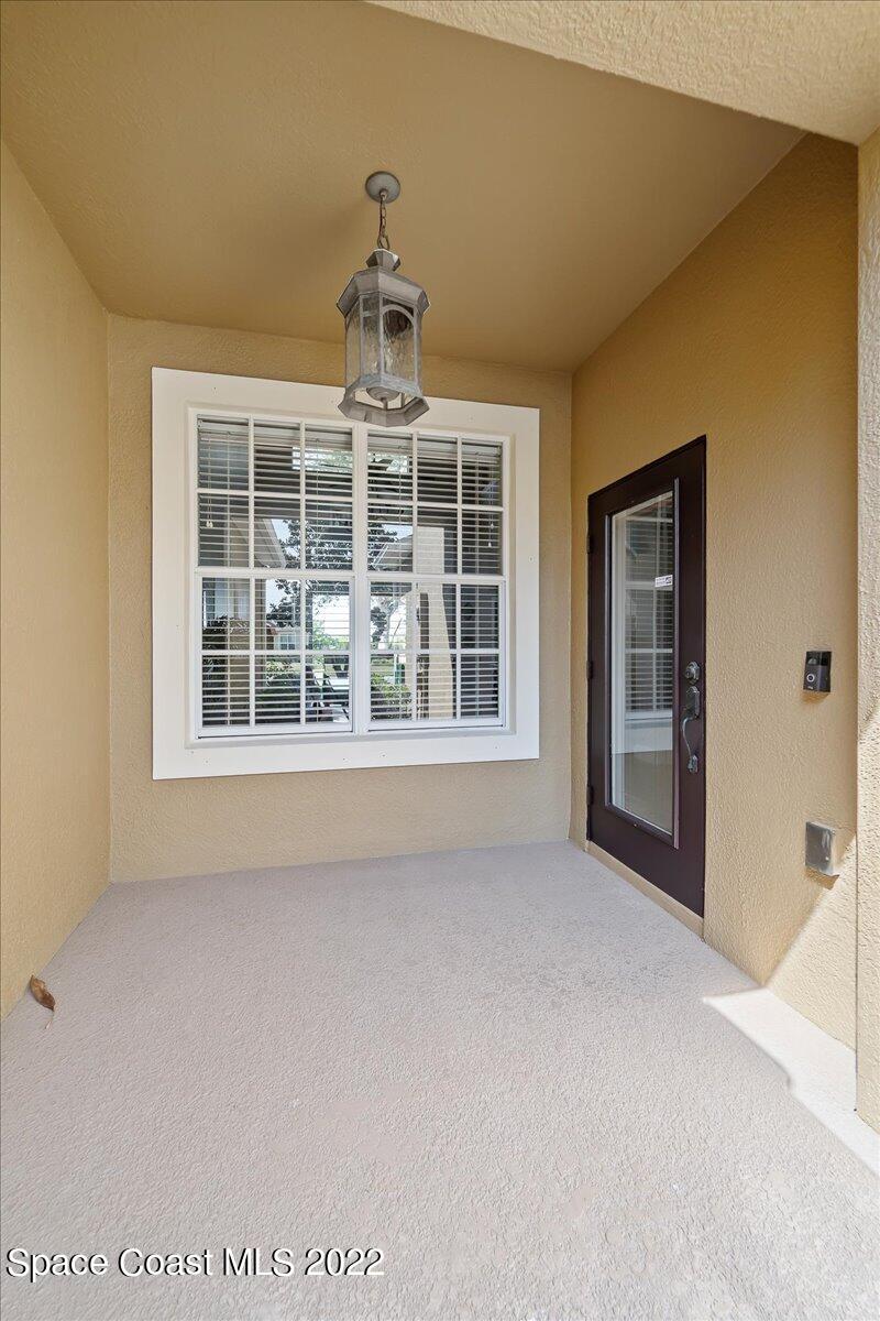 3126 Arden Circle Melbourne, FL 32934 - Photo 4 of 31 a view of an empty room with a window