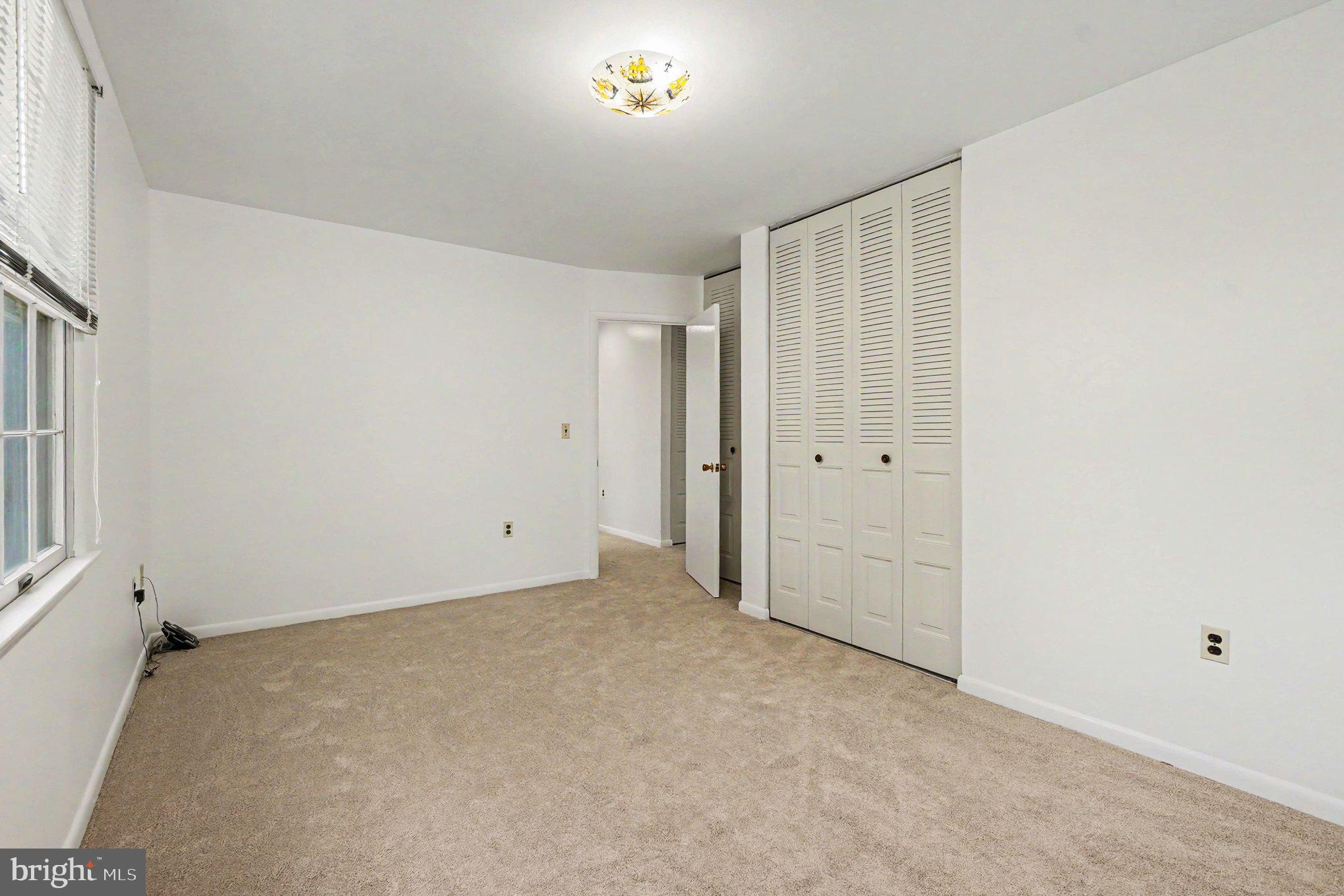 9204 Snyder Lane Perry Hall, MD 21128 - Photo 22 of 42 a view of an empty room with a window