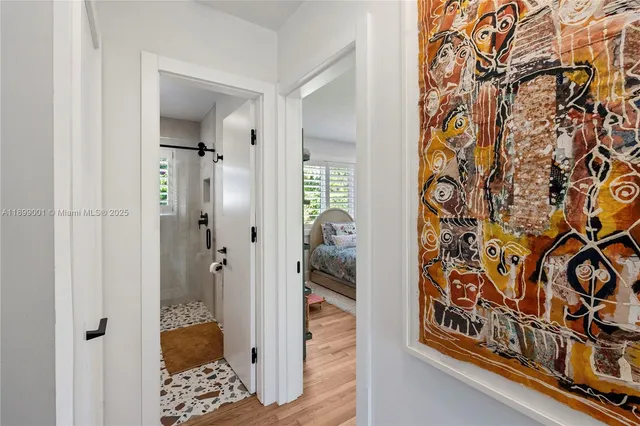 a bathroom with a bathtub and shower