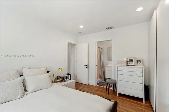 a bedroom with a bed and furniture