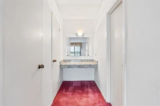 a view of a room with racks on the wall