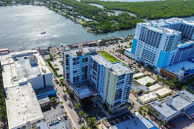 an aerial view of a house with a garden