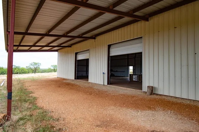 a view of a backyard of a house