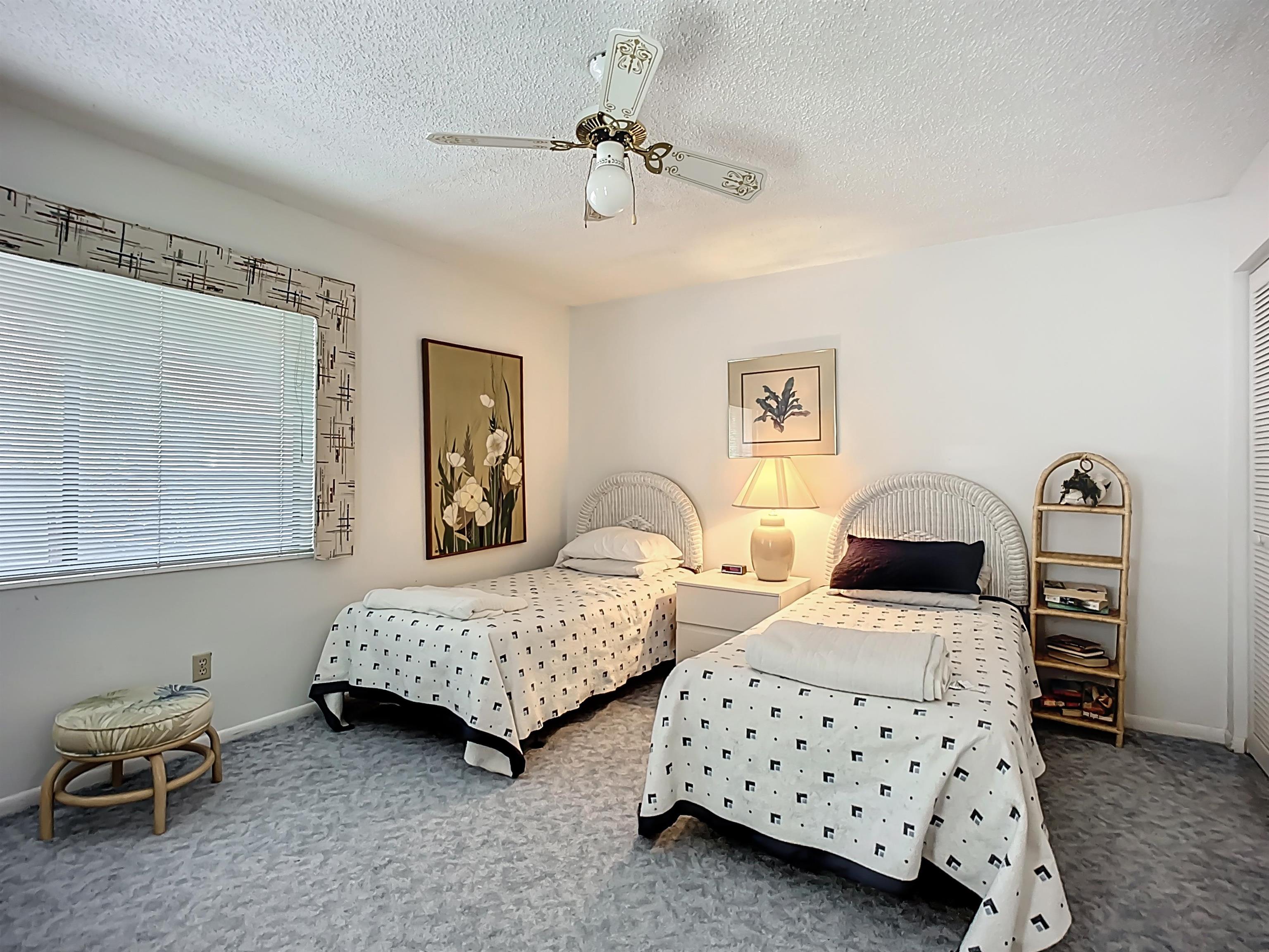 3960 A1A South, Unit 914 St. Augustine, FL 32080 - Photo 16 of 19 a bedroom with bed and window