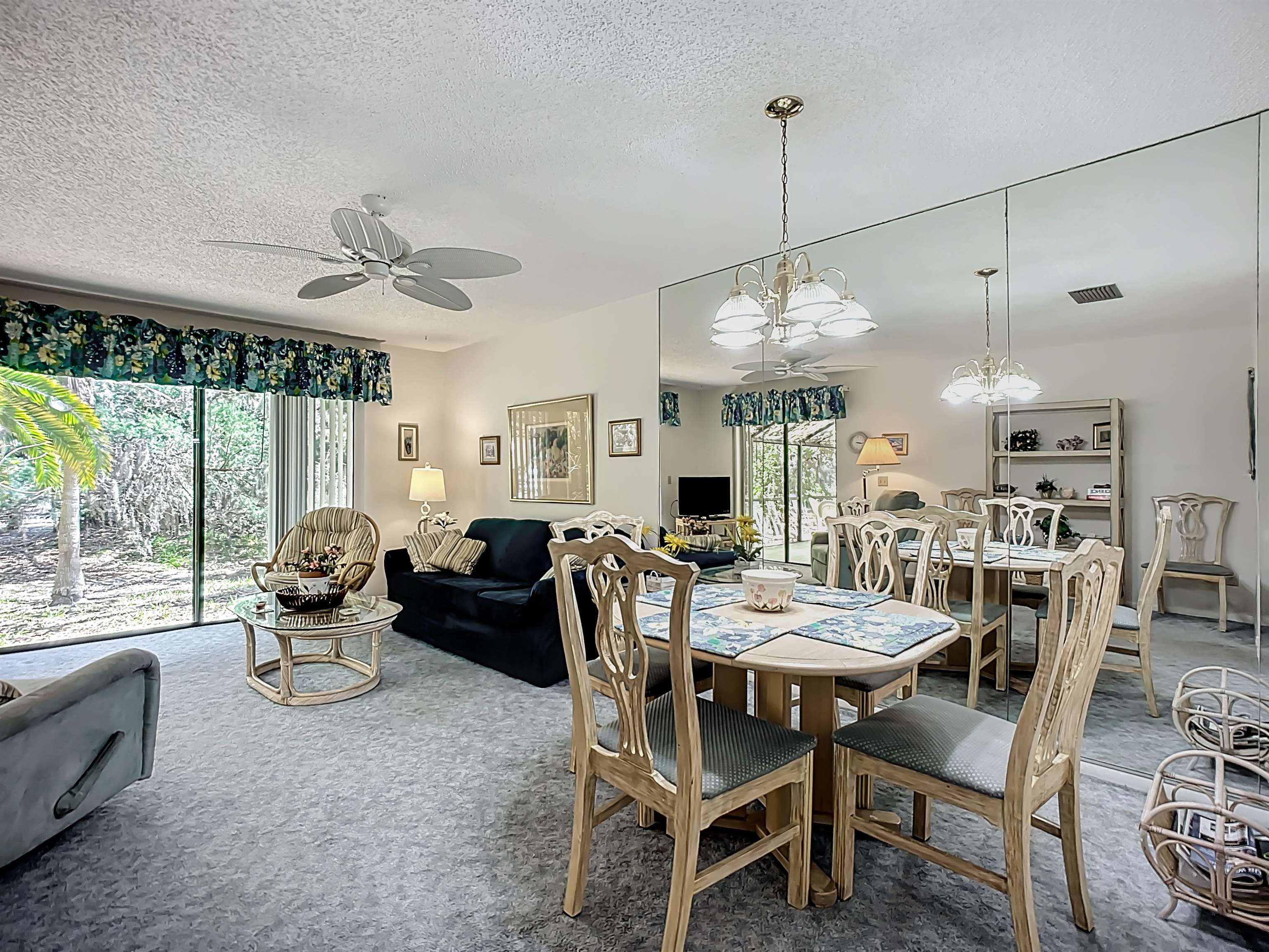 3960 A1A South, Unit 914 St. Augustine, FL 32080 - Photo 9 of 19 a view of a dining room with furniture window and outside view
