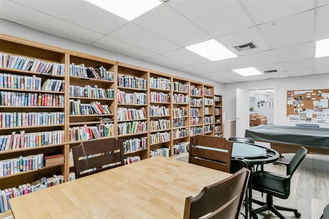a view of a swimming pool with a patio