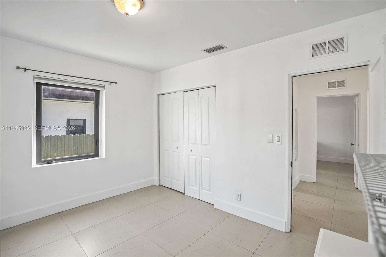 2290 Southwest 2nd Terrace Miami, FL 33135 - Photo 22 of 60 a view of an empty room with a bathroom