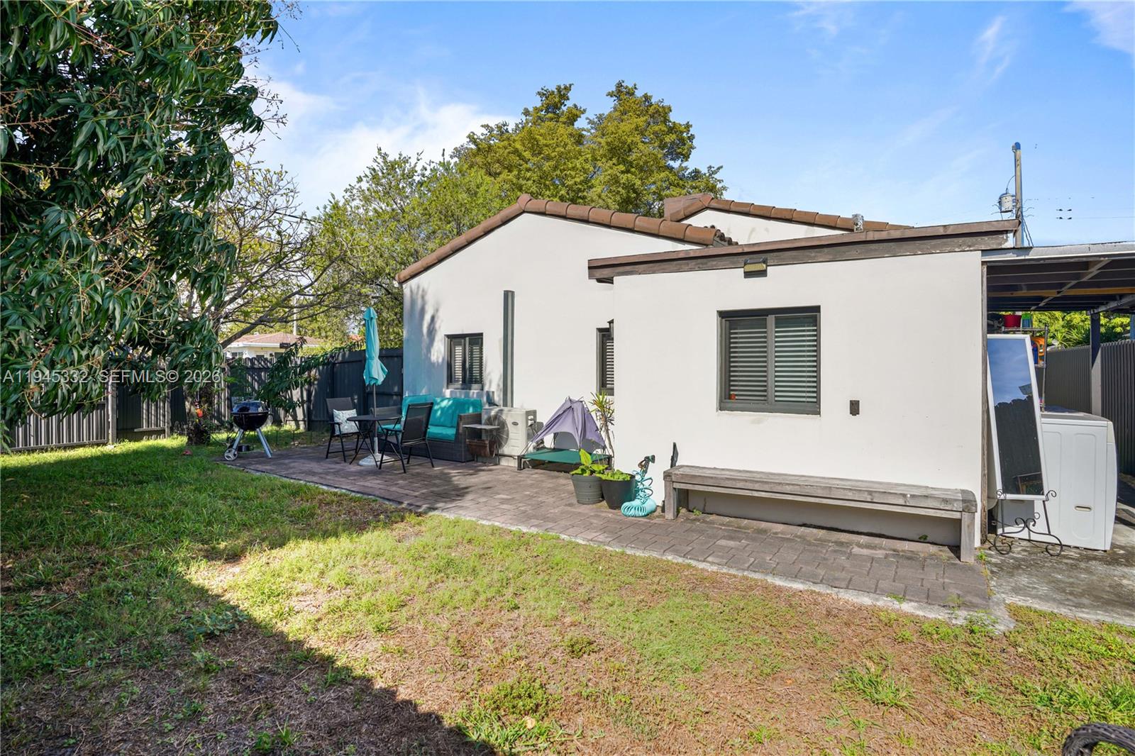 2290 Southwest 2nd Terrace Miami, FL 33135 - Photo 25 of 60 a view of a house with backyard and sitting area