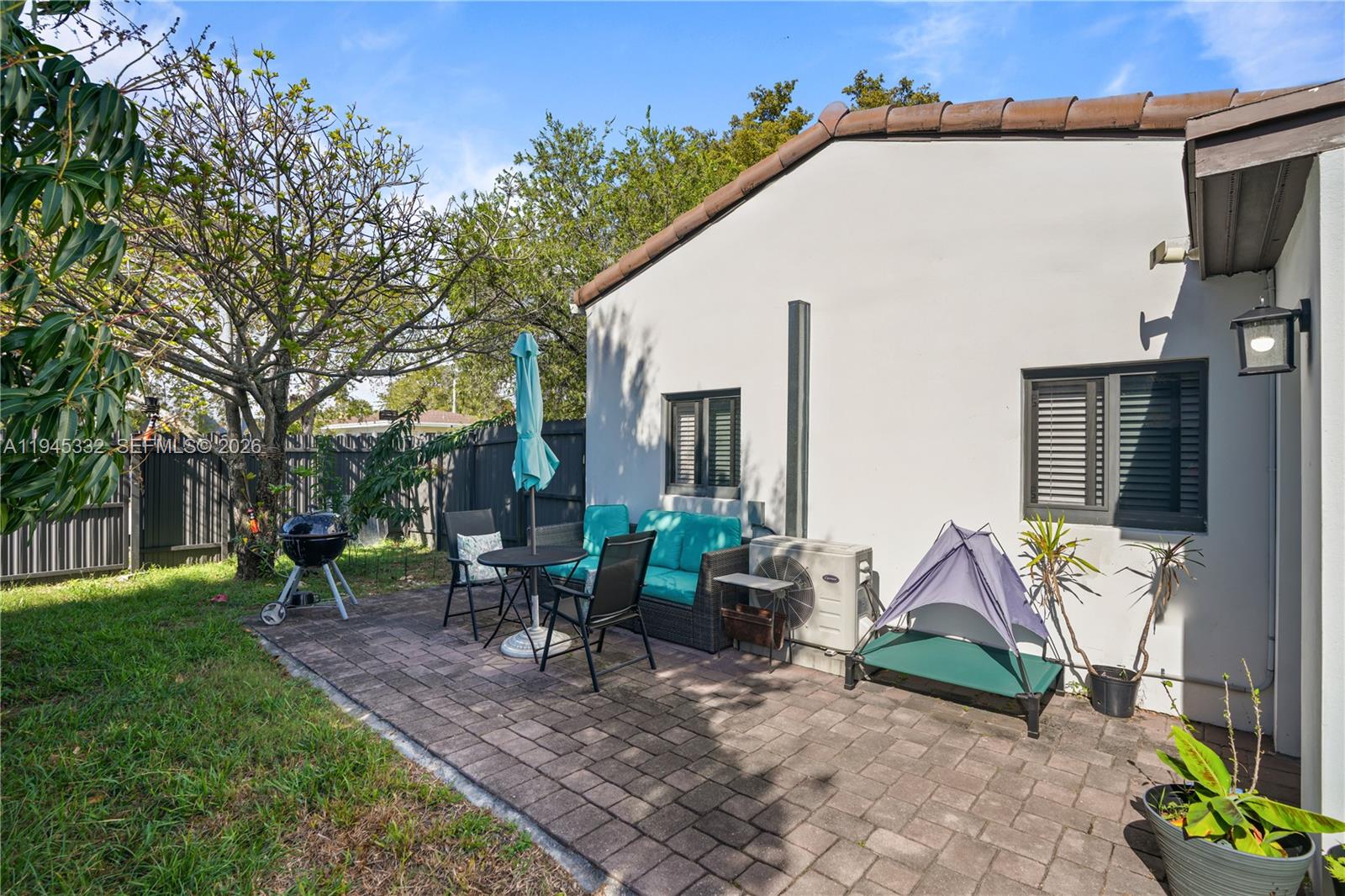 2290 Southwest 2nd Terrace Miami, FL 33135 - Photo 26 of 60 a view of a house with backyard porch and sitting area