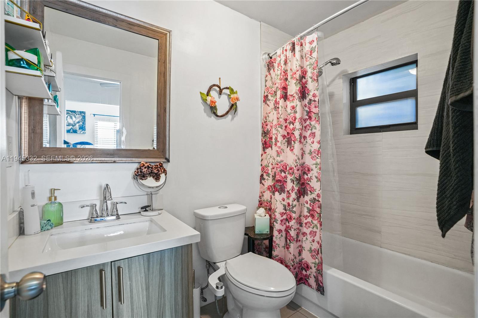 2290 Southwest 2nd Terrace Miami, FL 33135 - Photo 32 of 60 a bathroom with a sink toilet and shower