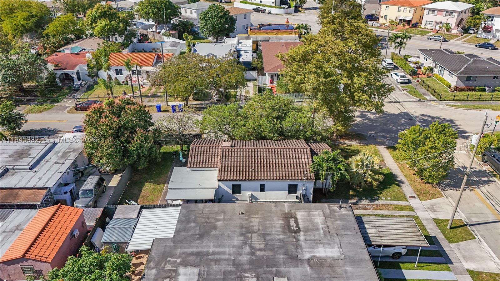 2290 Southwest 2nd Terrace Miami, FL 33135 - Photo 51 of 60 an aerial view of a house with a garden and deck