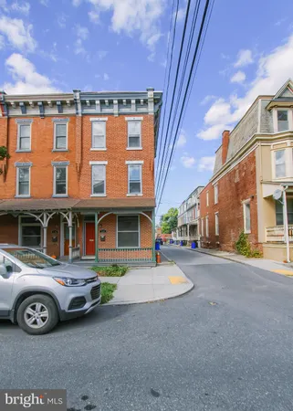 a car parked in front of a building