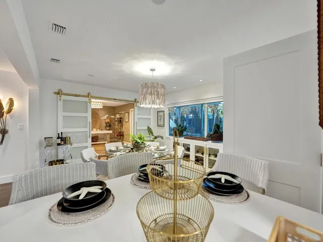 a bathroom with a sink vanity granite toilet tub and shower