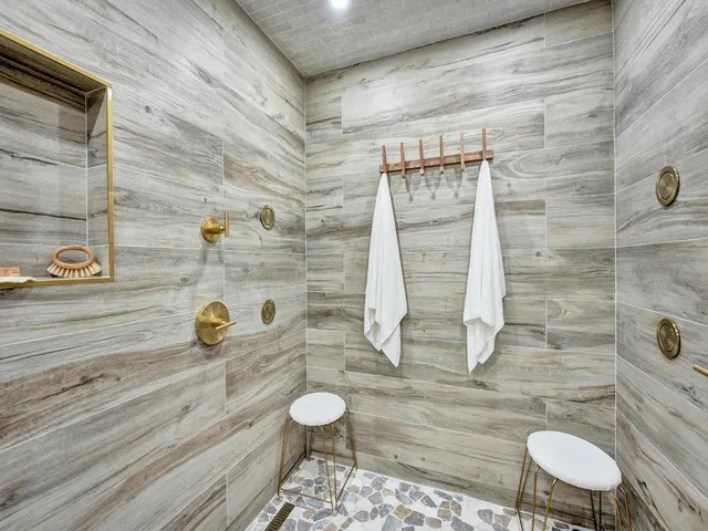 a bathroom with a toilet and a sink