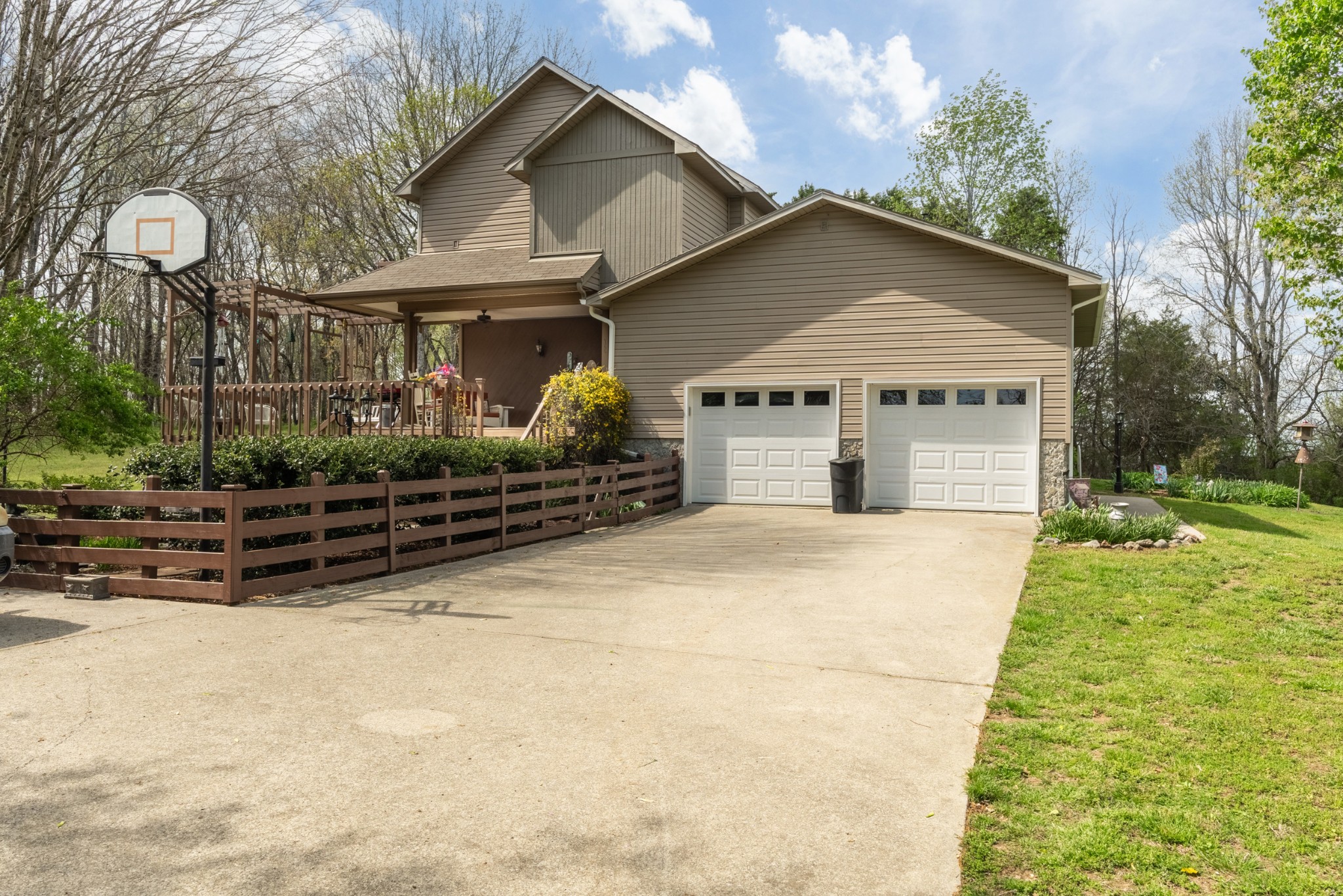 300 Wright Road Prospect, TN 38477 - Photo 20 of 65 a front view of a house with a yard and garage