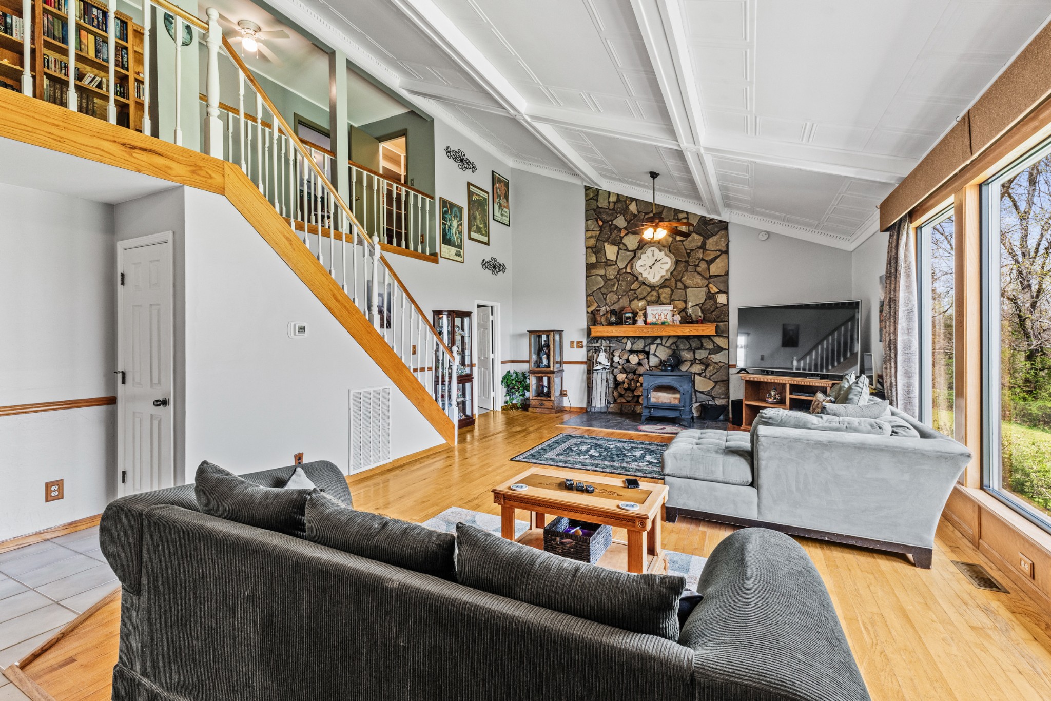 300 Wright Road Prospect, TN 38477 - Photo 25 of 65 a living room with furniture and a flat screen tv