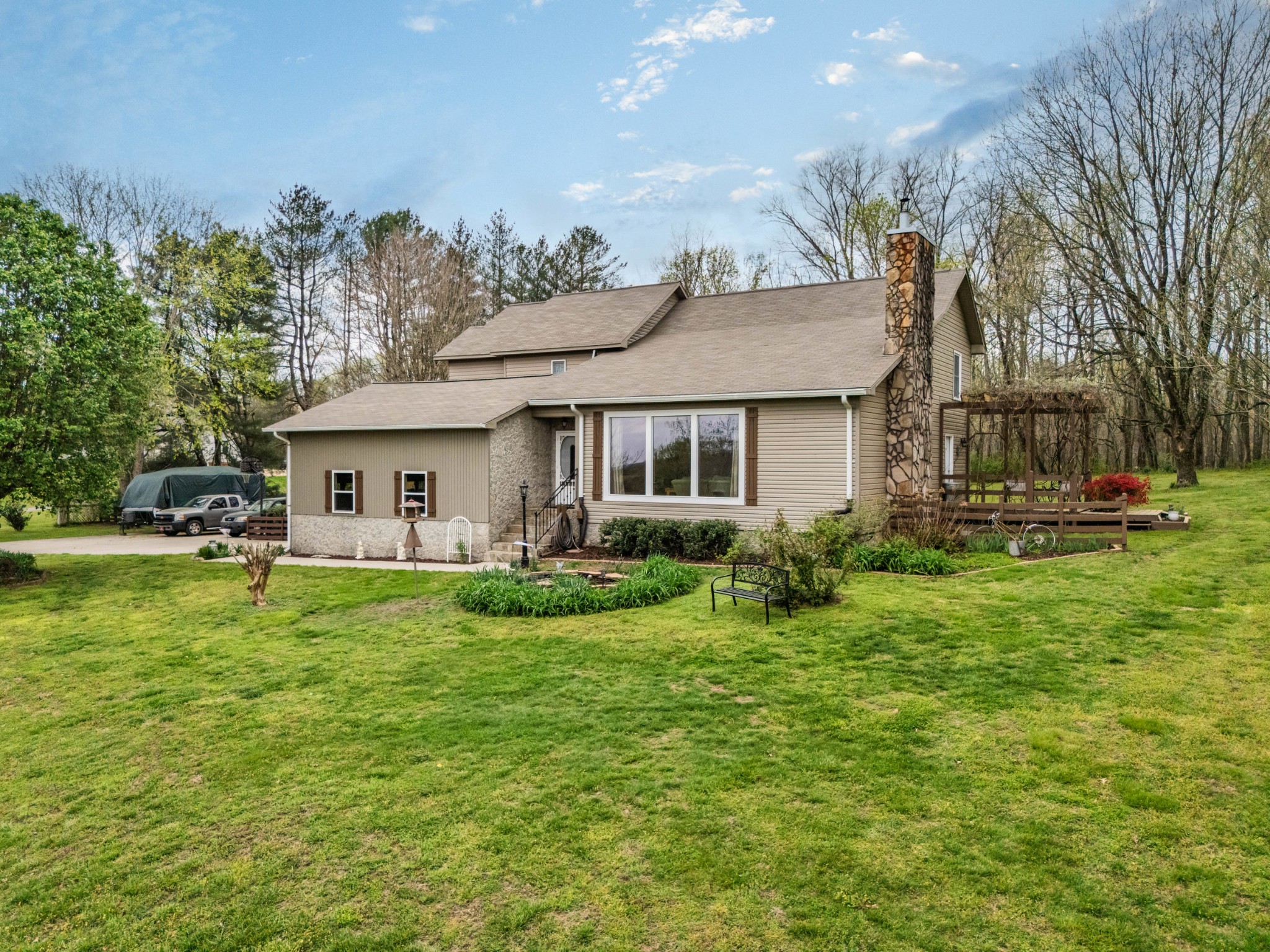 300 Wright Road Prospect, TN 38477 - Photo 3 of 65 a front view of a house with garden