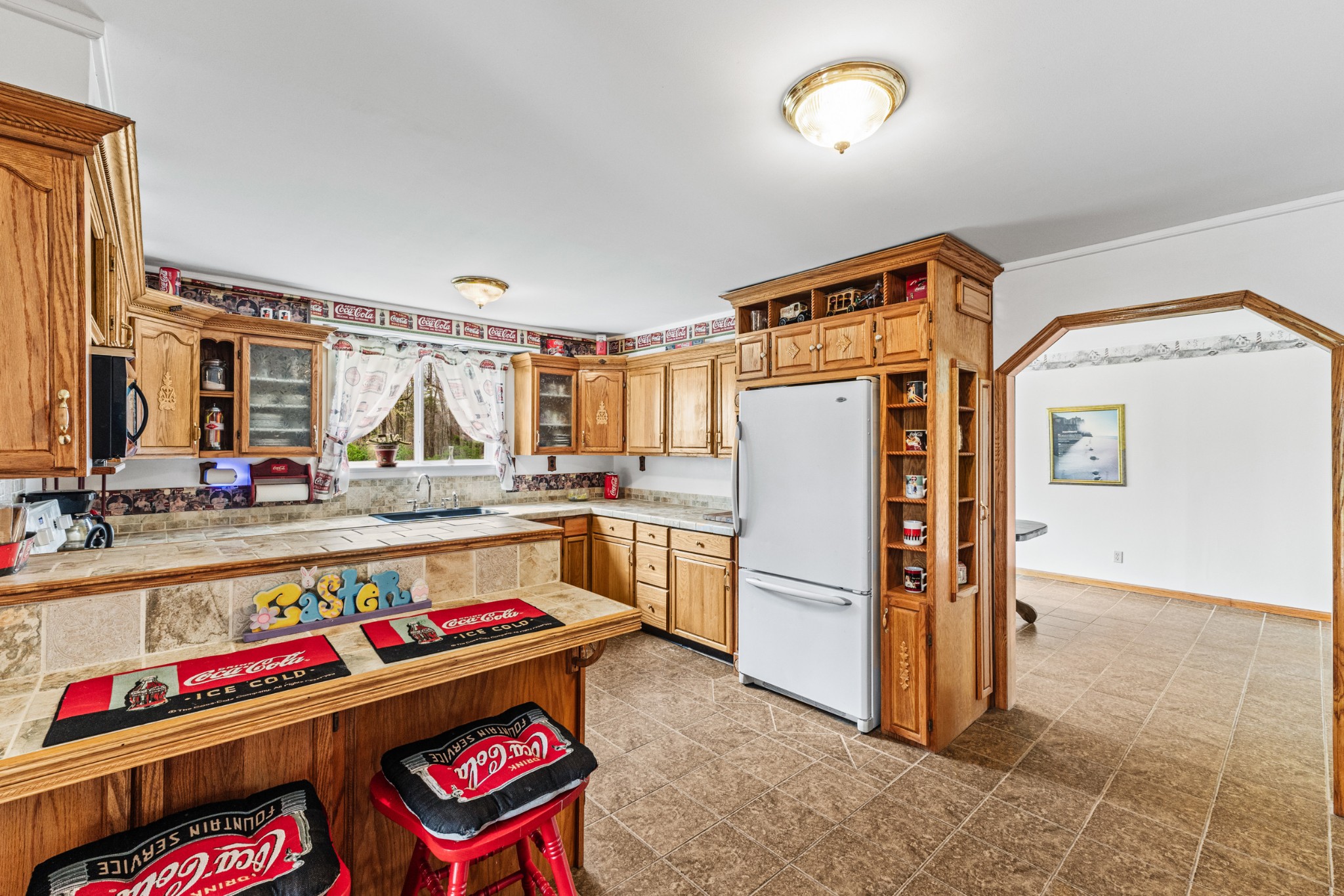 300 Wright Road Prospect, TN 38477 - Photo 31 of 65 a kitchen that has a lot of cabinets and refrigerator