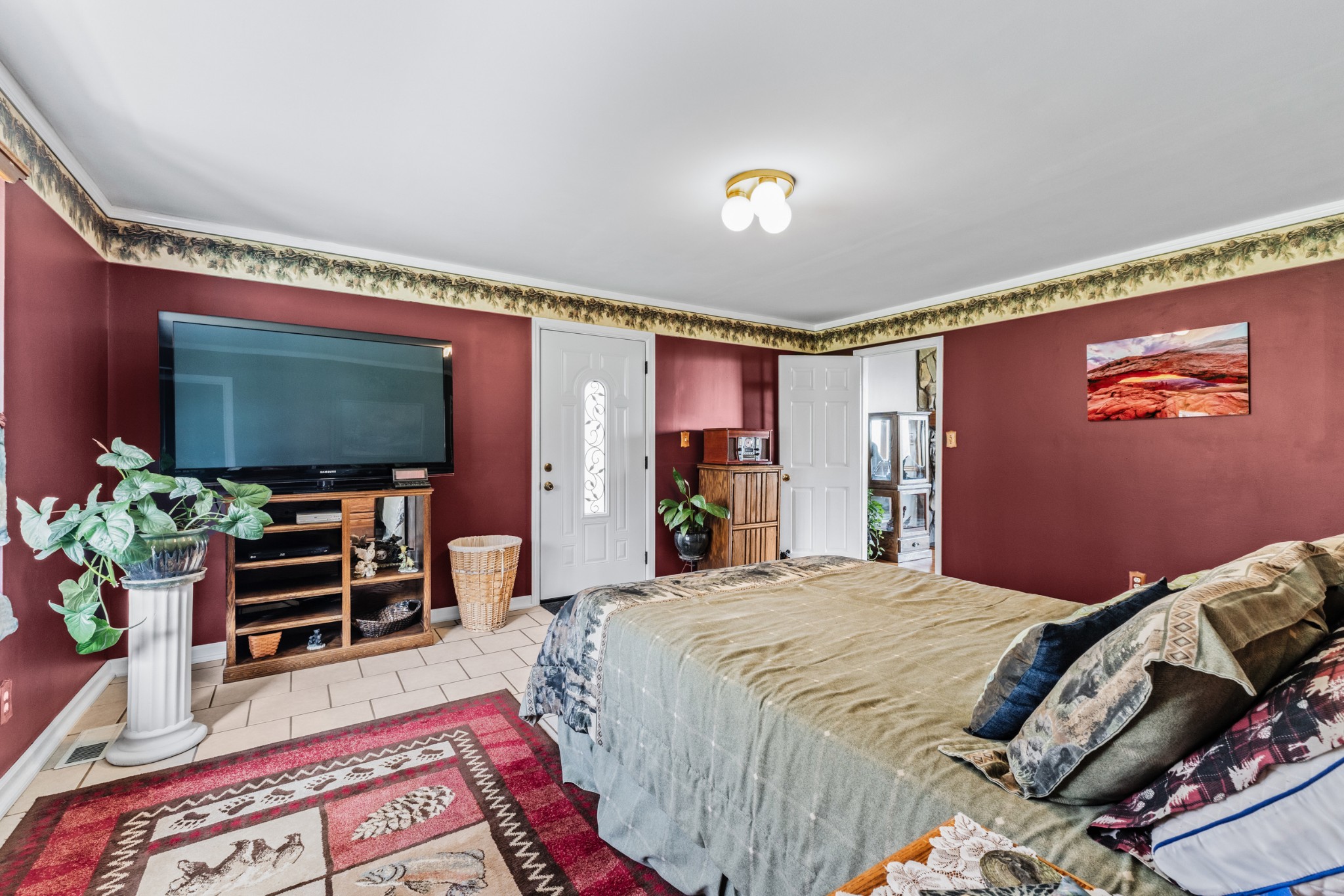 300 Wright Road Prospect, TN 38477 - Photo 39 of 65 a bedroom with a bed and a flat screen tv